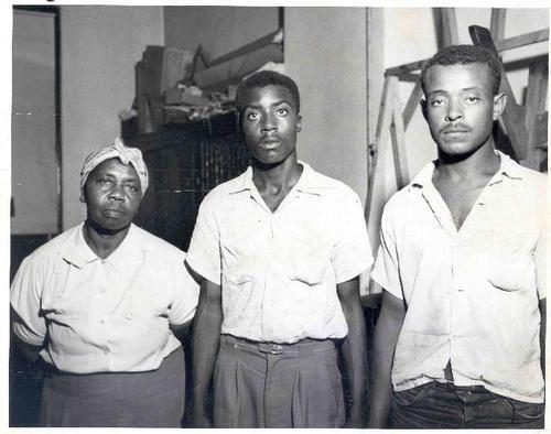 Photo of Willie Reed (middle) who testified to see Till was beaten in the Milam Plantation by J.W. Milam. 