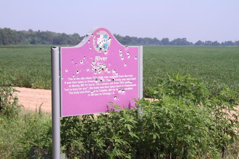 Tallahatchie Civil Rights Driving Tour sign, ~2015. This is the second sign erected here. It lasted from 2008 to 2016. It was when vandalism was discovered on this sign in 2016 that the issue of Emmett Till vandalism became a national issue. In 2021, this sign was displayed for three months in Flag Hall, the grand, mall-side entrance to the Smithsonian’s National Museum of American History.